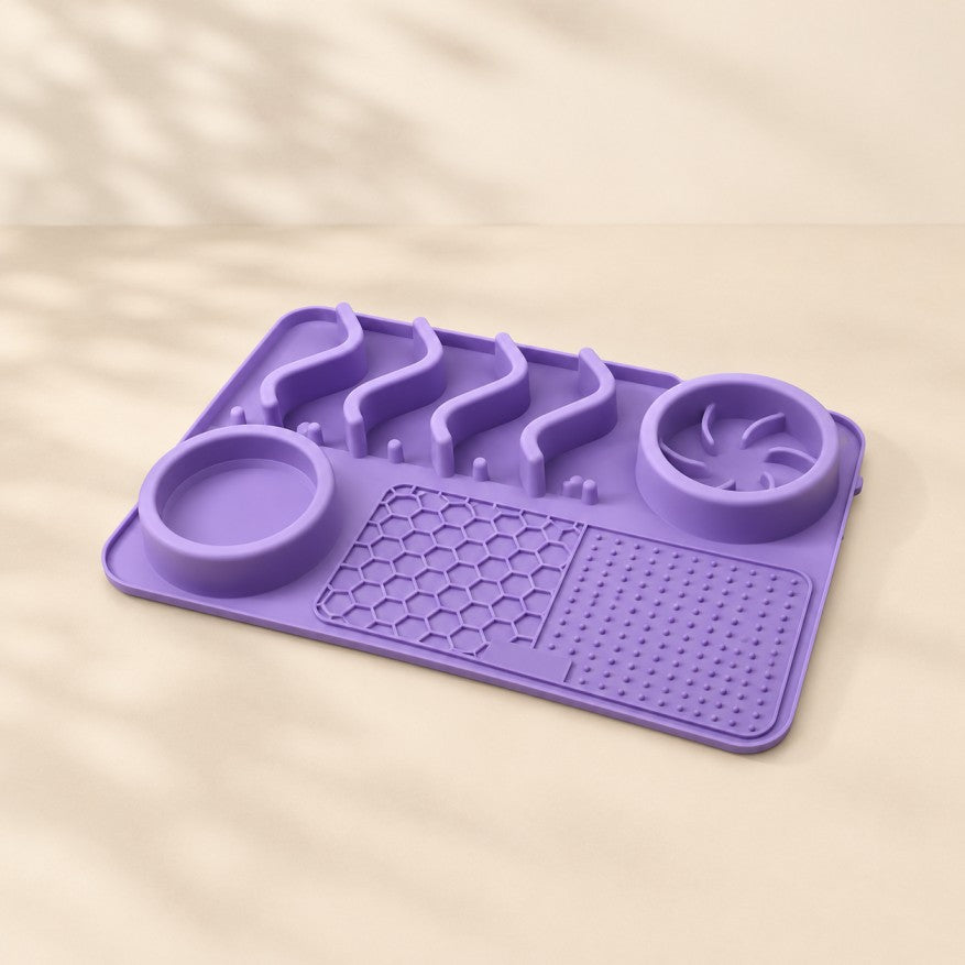 Purple silicone licking mat slow feeder with two bowls and textured sections